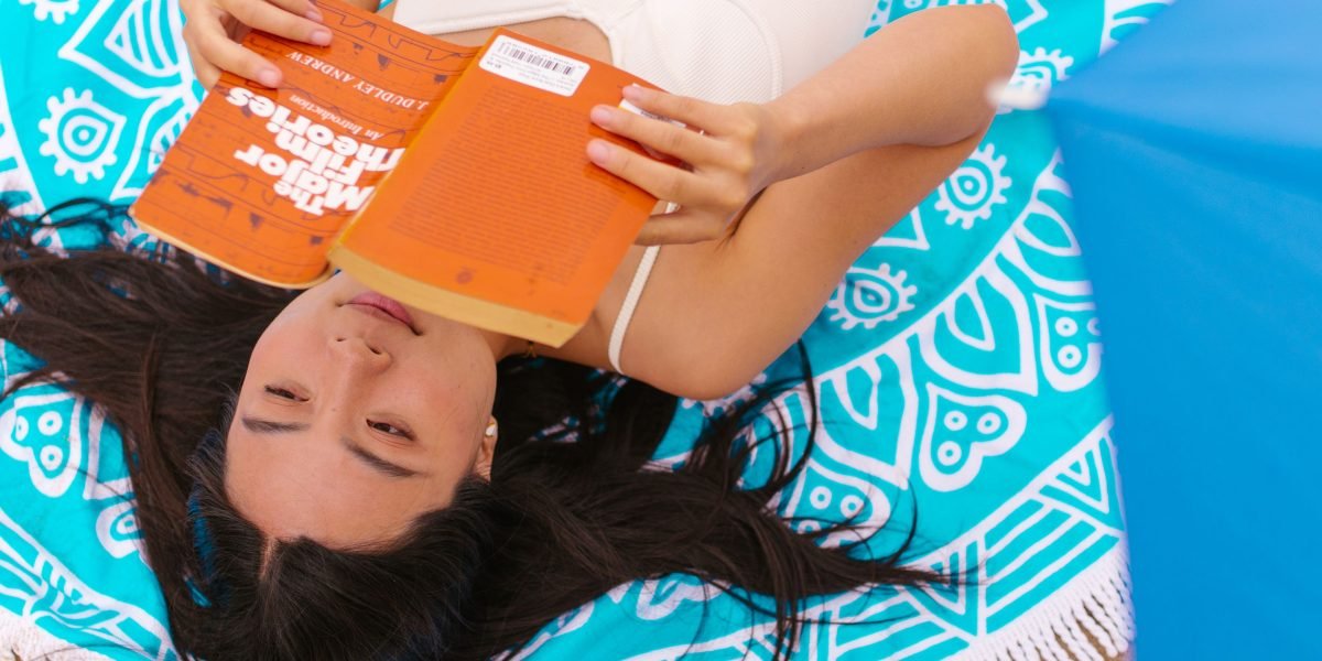 Immerse yourself in a captivating story, feeling the warmth of a perfect summer day.